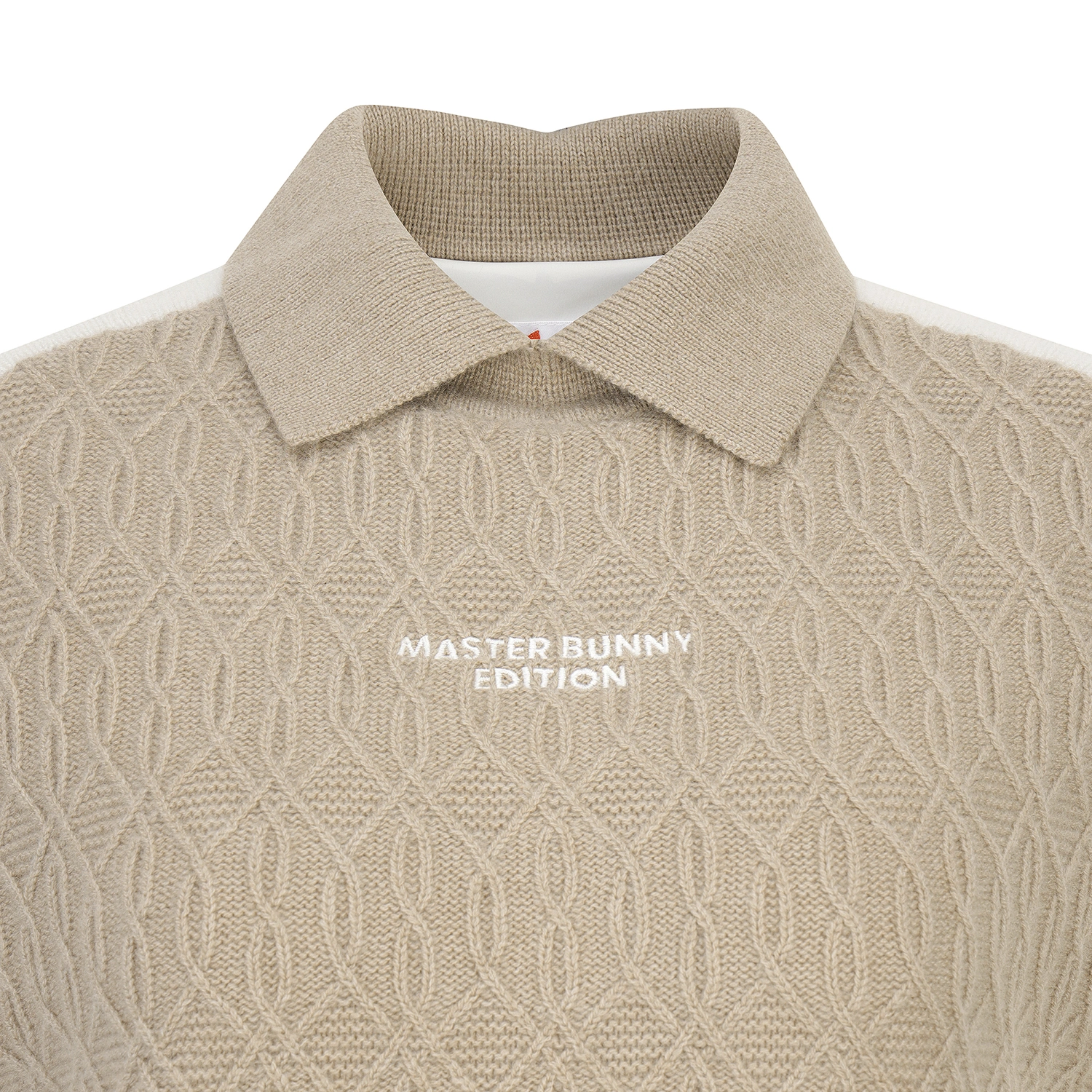Áo vest golf nữ cổ bẻ họa tiết dệt màu be — ảnh 3