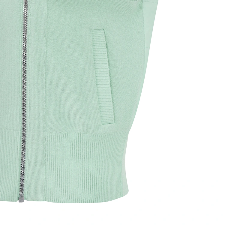 Áo vest golf nữ cổ cao khóa chéo màu xanh mint — ảnh 4